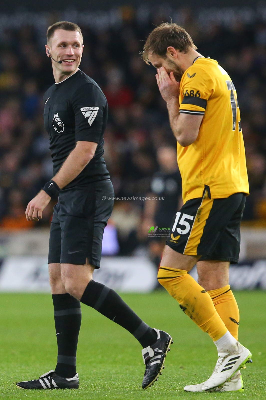 Referee Thomas Bramall laughs with Craig Dawson #15 of Wolverhampton Wanderers during the Premier League match Wolverhampton Wanderers vs Everton at Molineux, Wolverhampton, United Kingdom, 30th December 2023

(Photo by Gareth Evans/News Images)