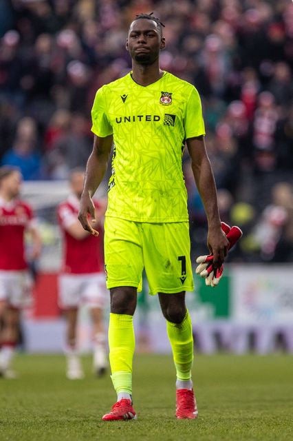 Wrexham's Arthur Okonkwo celebrates victory during the Sky Bet League 1 match Wrexham vs Stockport County at SToK Cae Ras, Wrexham, United Kingdom, 22nd March 2025

(Photo by Nik Mesney/News Images)