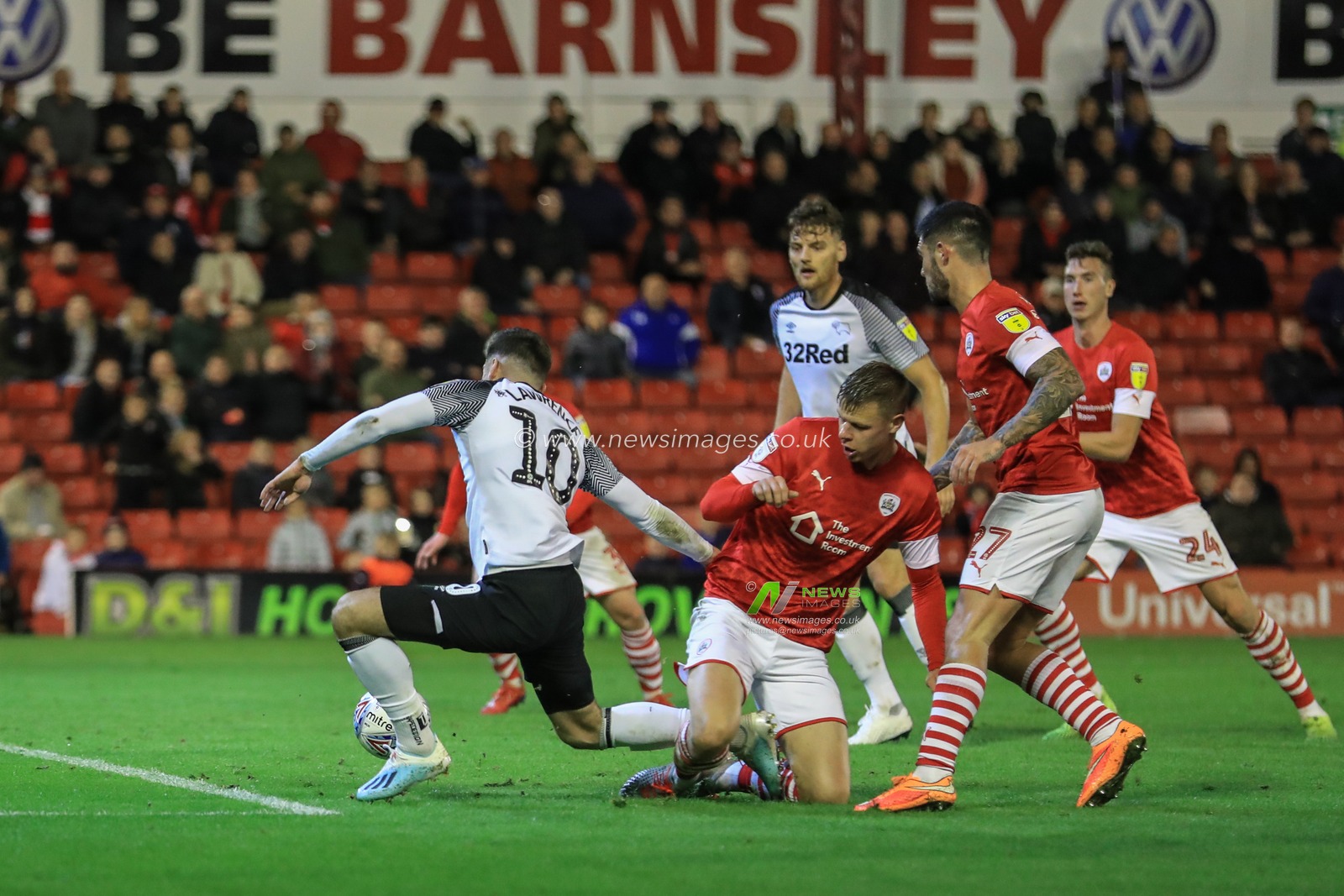 2nd October 2019, Oakwell, Barnsley, England; Sky Bet Championship, Barnsley v Derby County : Mads Andersen (6) of Barnsley brings down Tom Lawrence (10) of Derby County in the area for a penalty 

Credit: Mark Cosgrove/News Images
