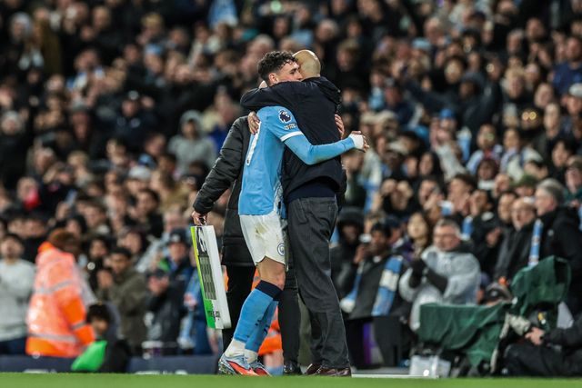 Phil Foden of Manchester City embraces Josep Guardiola manager of Manchester City as he is substituted off during the Premier League match Manchester City vs Crystal Palace at Etihad Stadium, Manchester, United Kingdom on 13 May 2026

(Photo by Mark Cosgrove/News Images)