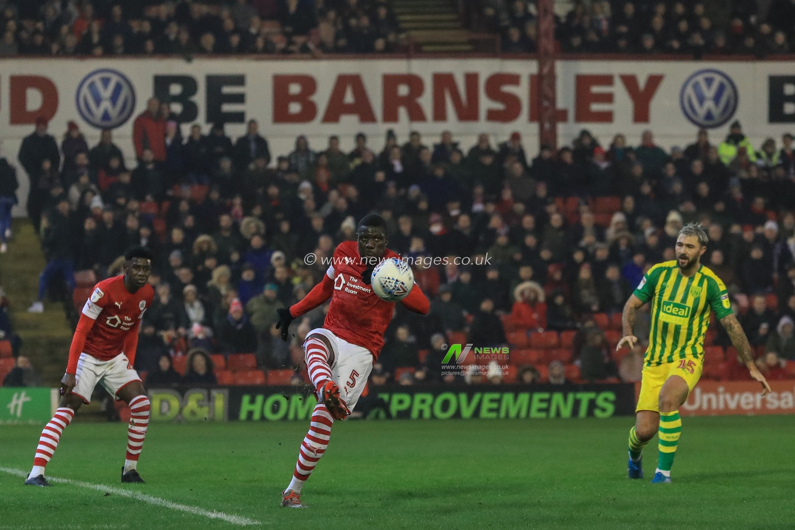 26th December 2019, Oakwell, Barnsley, England; Sky Bet Championship, Barnsley v West Bromwich Albion : Bambo Diaby (5) of Barnsley clears the ball 

Credit: Mark Cosgrove/News Images