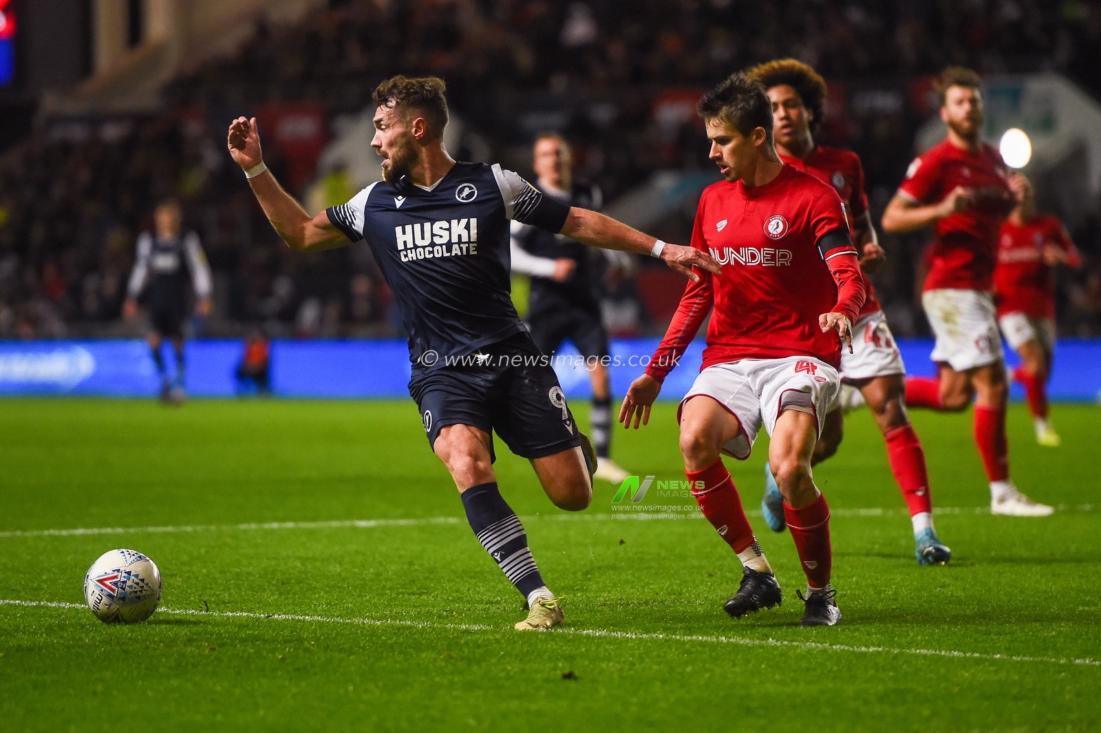 10th December 2019, Ashton Gate, Bristol, England; Sky Bet Championship, Bristol City v Millwall : Tom Bradshaw (09) of Millwall looks for a pass under pressure fromÃdÃ¡m Nagy (4) of Bristol City 

Credit: Gareth Dalley/News Images