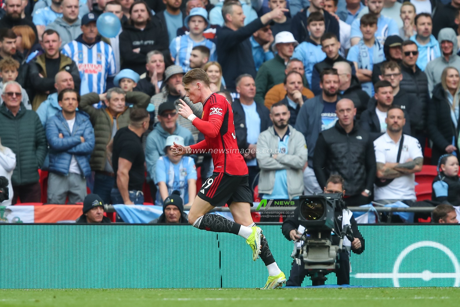 Scott McTominay of Manchester United celebrates his goal to make it 0-1 Manchester United, during the Emirates FA Cup Semi-Final match Coventry City vs Manchester United at Wembley Stadium, London, United Kingdom, 21st April 2024

(Photo by Gareth Evans/News Images)
