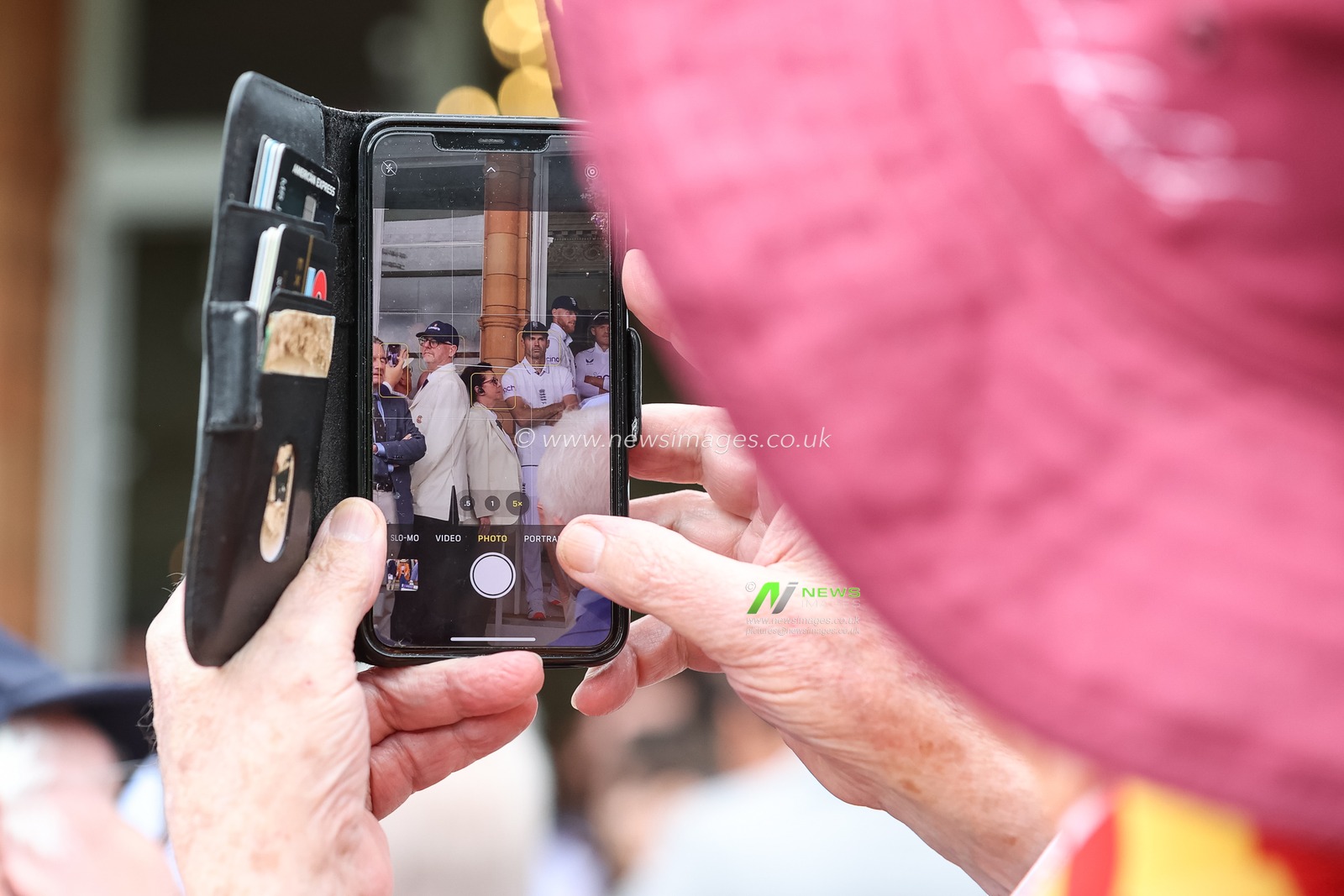 A MCC member takes a photo of James Anderson of England during the 1st Rothesay Test Match day 1 England v West Indies at Lords, London, United Kingdom, 10th July 2024

(Photo by Mark Cosgrove/News Images)