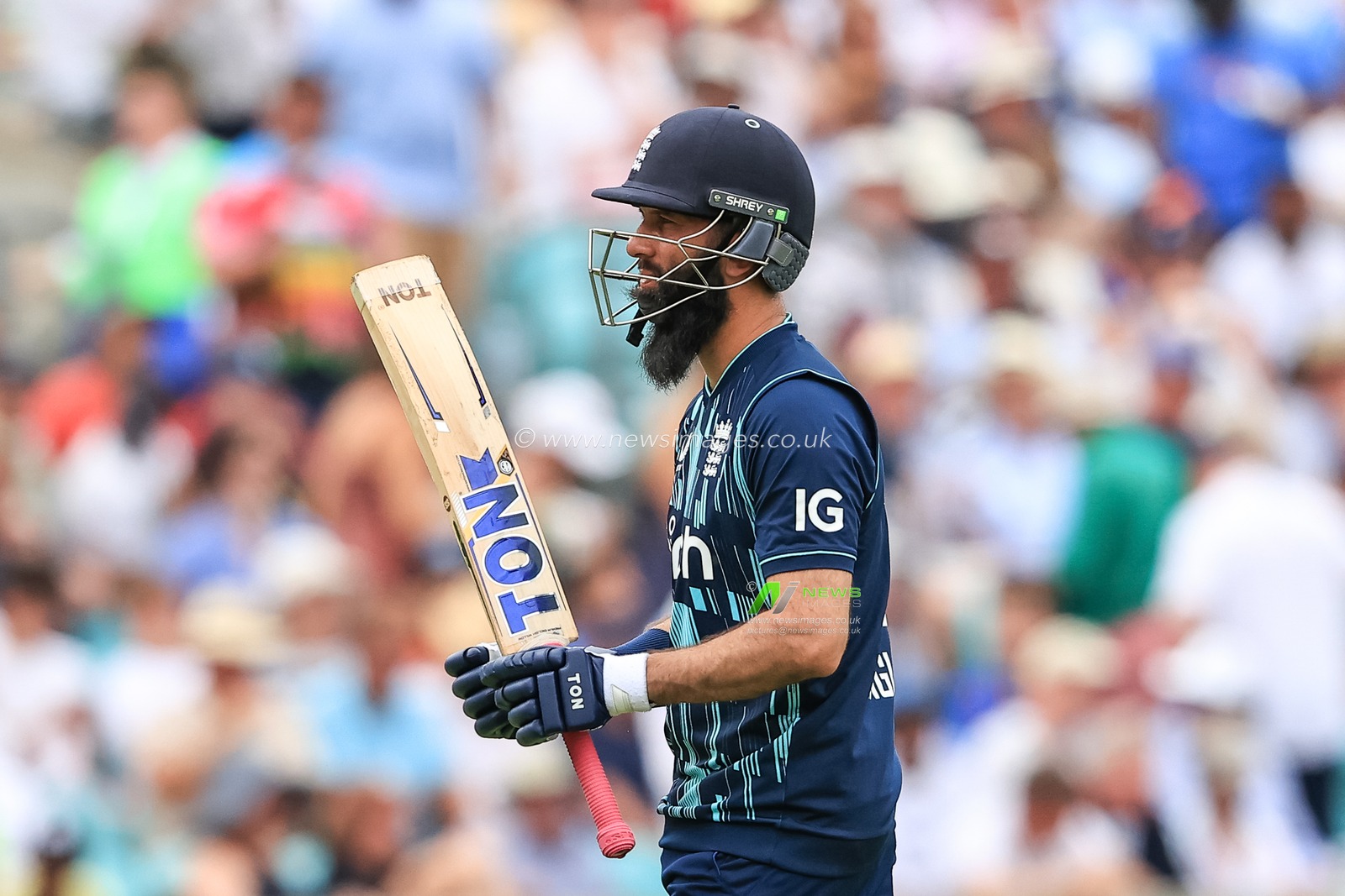Moeen Ali of England leaves the fields after being dismissed