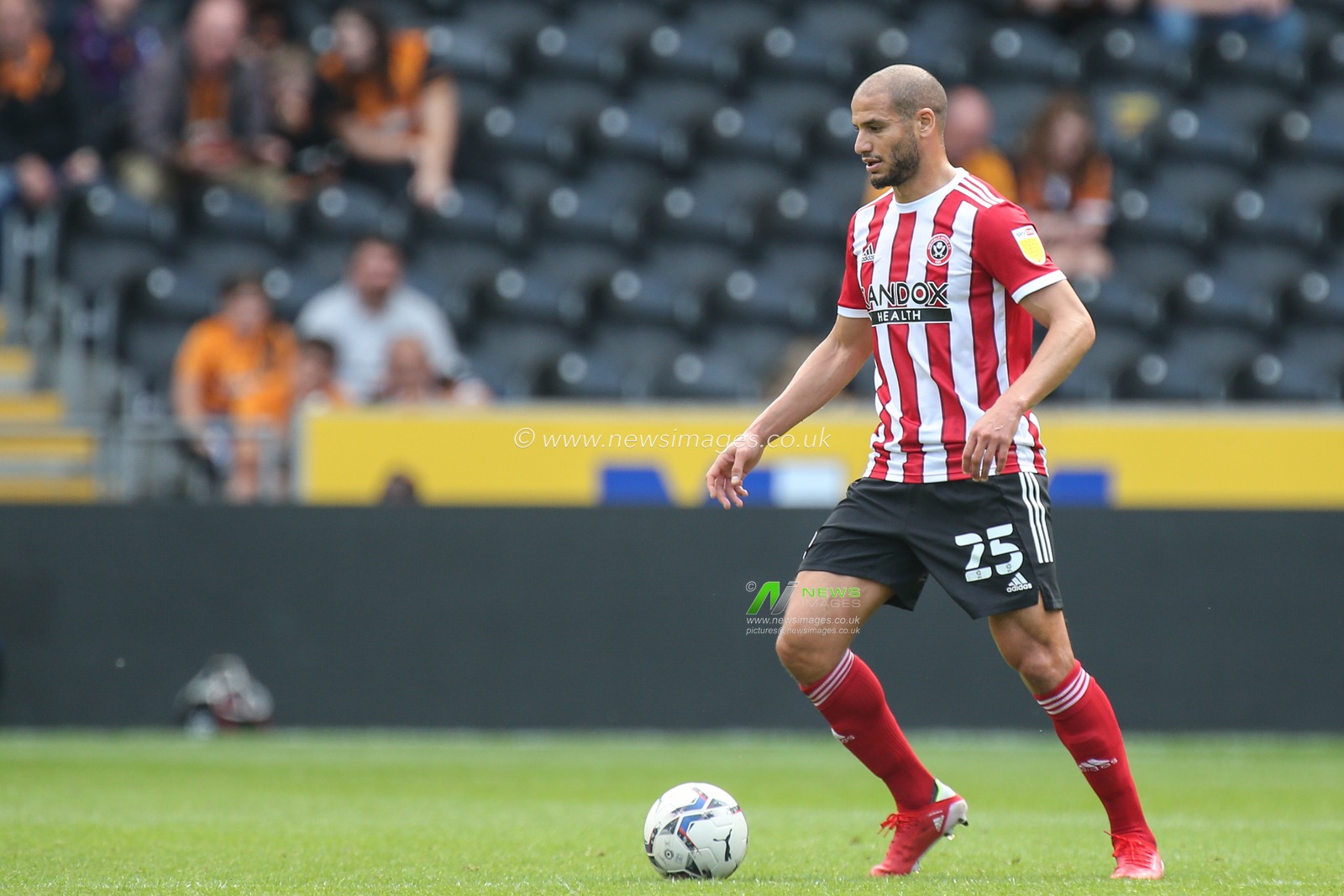 Adlene Guedioura #25 of Sheffield United with the ball