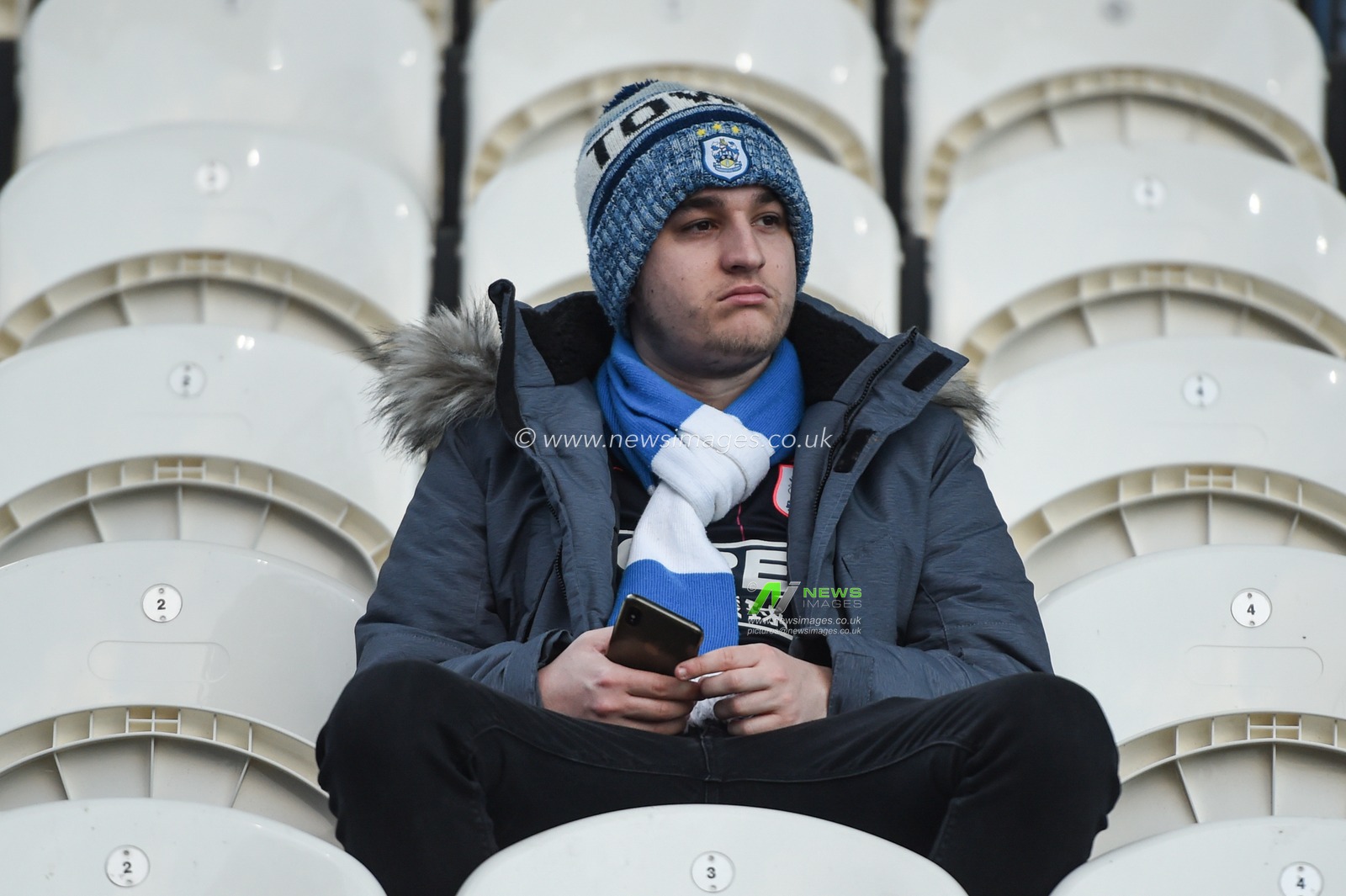 21st December 2019, John Smith's Stadium, Huddersfield, England; Sky Bet Championship, Huddersfield Town v Nottingham Forest : Huddersfield Town supporter.

Credit: Dean Williams/News Images