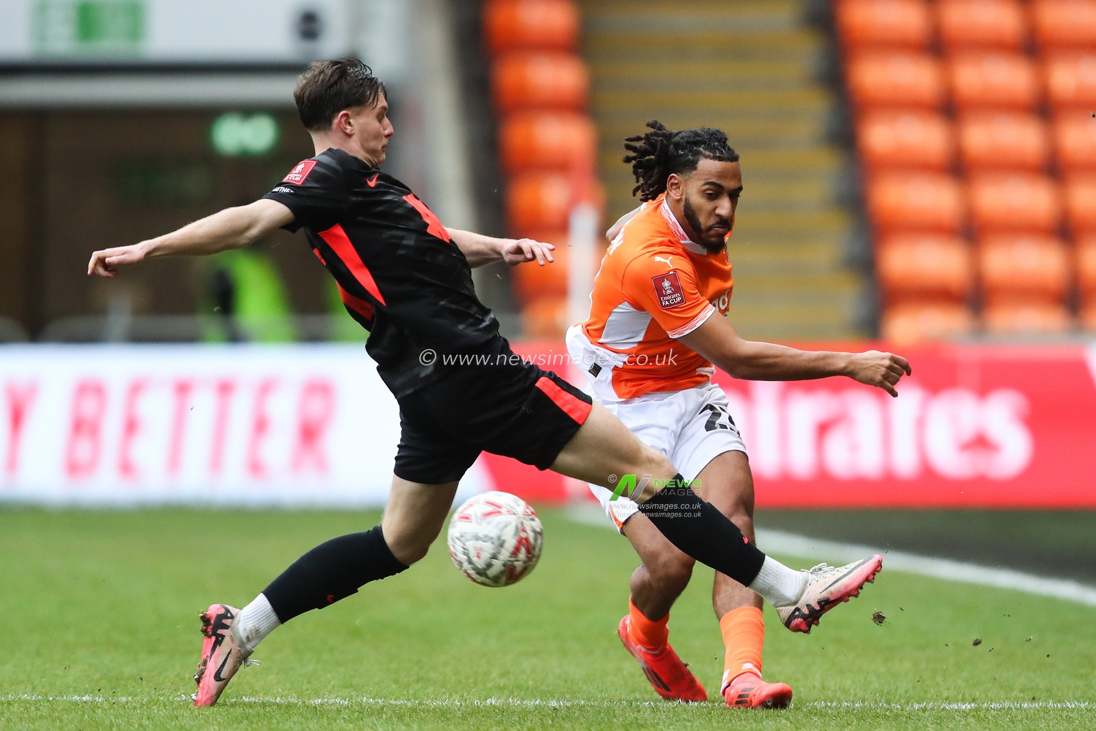 Dom Thompson of Blackpool passes the ball during the Emirates FA Cup 2nd Round match Blackpool vs Birmingham City at Bloomfield Road, Blackpool, United Kingdom, 1st December 2024

(Photo by Gareth Evans/News Images)