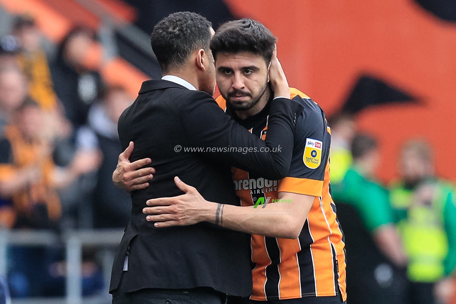 Liam Rosenior manager of Hull City hugs Ozan Tufan as he comes off in the second half of the Sky Bet Championship match Hull City vs Watford at MKM Stadium, Hull, United Kingdom, 22nd April 2023

(Photo by James Heaton/News Images)