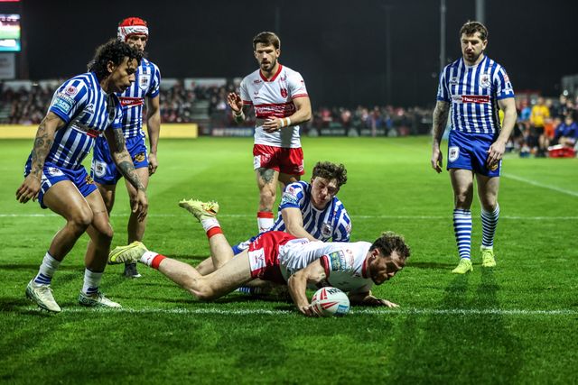 Joe Burgess of Hull KR jumps up to win the high ball and goes over for a try making the score 4-0 during the Betfred Super League round 6 match Hull KR vs St Helens at Sewell Group Craven Park, Hull, United Kingdom on 27 March 2026

(Photo by Alfie Cosgrove/News Images)