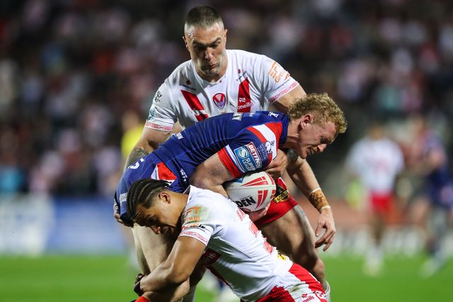 Lachlan Walmsley of Wakefield Trinity is tackled during the Betfred Super League  Round 7 match St Helens vs Wakefield Trinity at Totally Wicked Stadium, St Helens, United Kingdom, 11th April 2025

(Photo by Gareth Evans/News Images)
