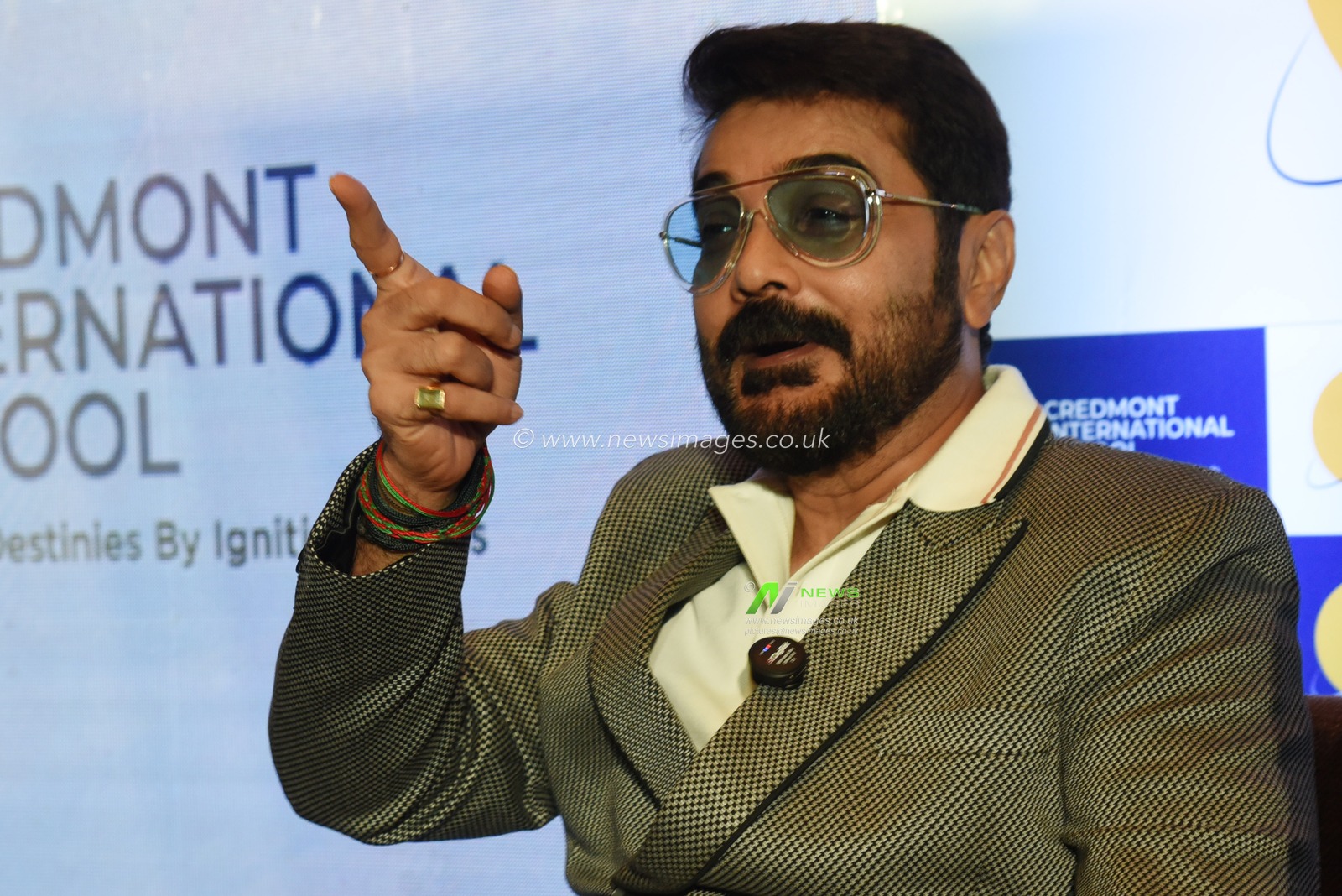 Indian Actor Prosenjit Chatterjee react at the media conferences during Credmont International School announced its entry into Kolkata, promising to redefine the cityâ€™s educational landscape. Located at Kolkata West International City, Howrah, the sprawling 3.3-acre campus is set to provide a world-class learning environment with cutting-edge facilities. What sets Credmont apart from other CBSE schools is its integration of advanced artificial intelligence (AI) technology into every aspect of teaching and learning. From AI-powered smartboards and interactive classrooms to AI-enabled labs, the school leverages cutting-edge tools to provide personalized learning experiences tailored to each student's needs. This innovation ensures a future-ready education, making Credmont a unique and forward-thinking choice for parents. The annual fee is â‚¹3,00,000, inclusive of all facilities and services.  In Kolkata on December 11,2024,Pictures by Debajyoti Chakraborty.(Photo: Debajyoti Chakraborty/News Images)