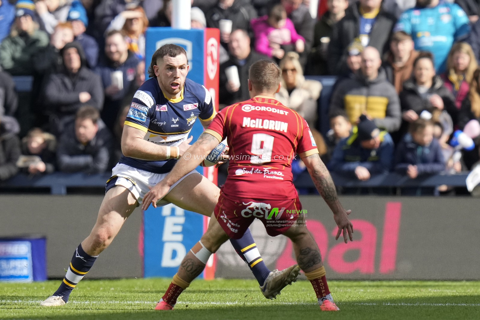 Cameron Smith #13 of Leeds Rhinos runs at Michael McIlorum #9 of Catalans Dragons during the Betfred Super League Round 6 match Leeds Rhinos vs Catalans Dragons at Headingley Stadium, Leeds, United Kingdom, 25th March 2023

(Photo by Steve Flynn/News Images)