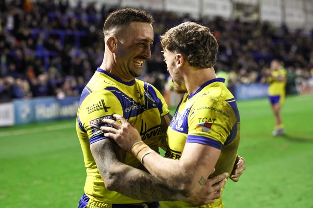 Paul Vaughan of Warrington Wolves and Matty Ashton of Warrington Wolves embrace each other as they celebrate the win during the Betfred Super League Round 2 match Warrington Wolves vs Catalans Dragons at Luke Littler Stadium, Warrington, United Kingdom, 21st February 2025

(Photo by Mark Cosgrove/News Images)