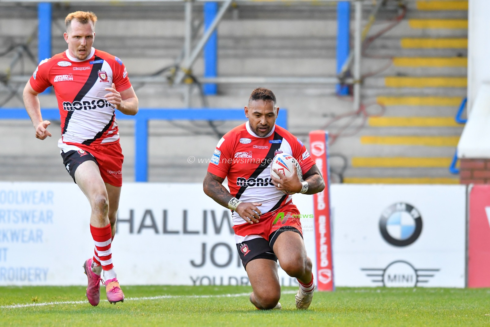 Krisnan Inu of Salford Red Devils goes over for a try to make it 6 - 4