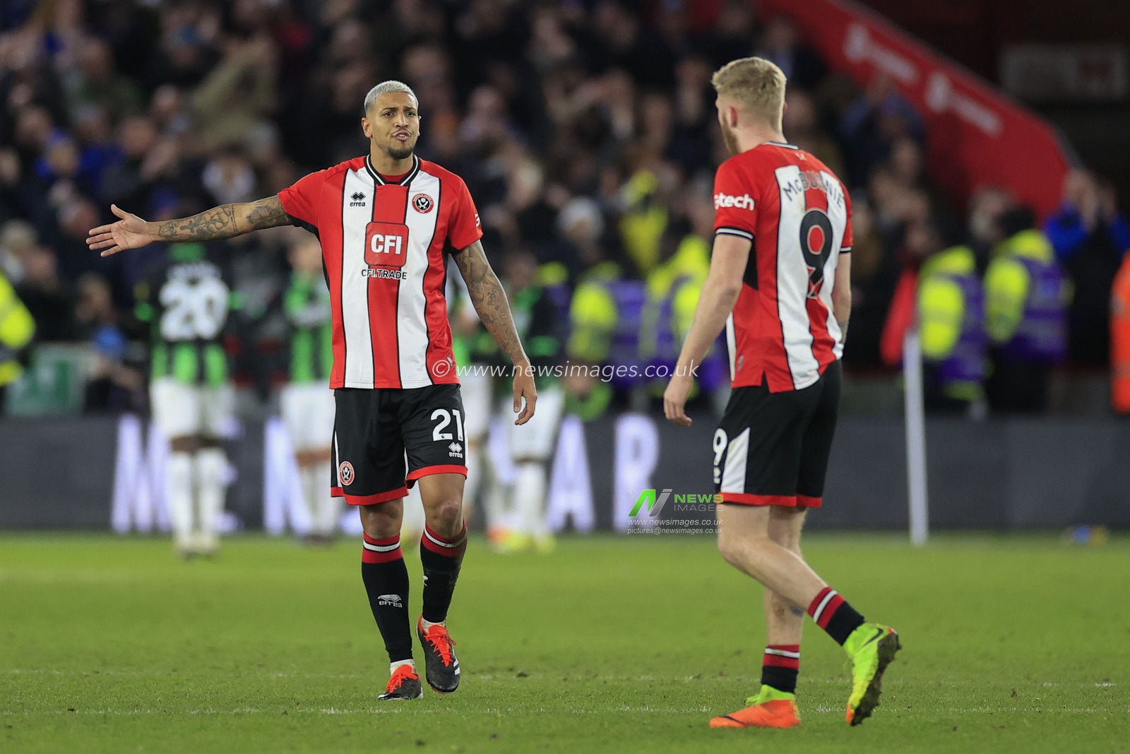 Vinicius Souza of Sheffield United has a discussion with Oliver McBurnie of Sheffield United as Brighton score to go 2-5 in front during the Emirates FA Cup Fourth Round match Sheffield United vs Brighton and Hove Albion at Bramall Lane, Sheffield, United Kingdom, 27th January 2024

(Photo by Conor Molloy/News Images)