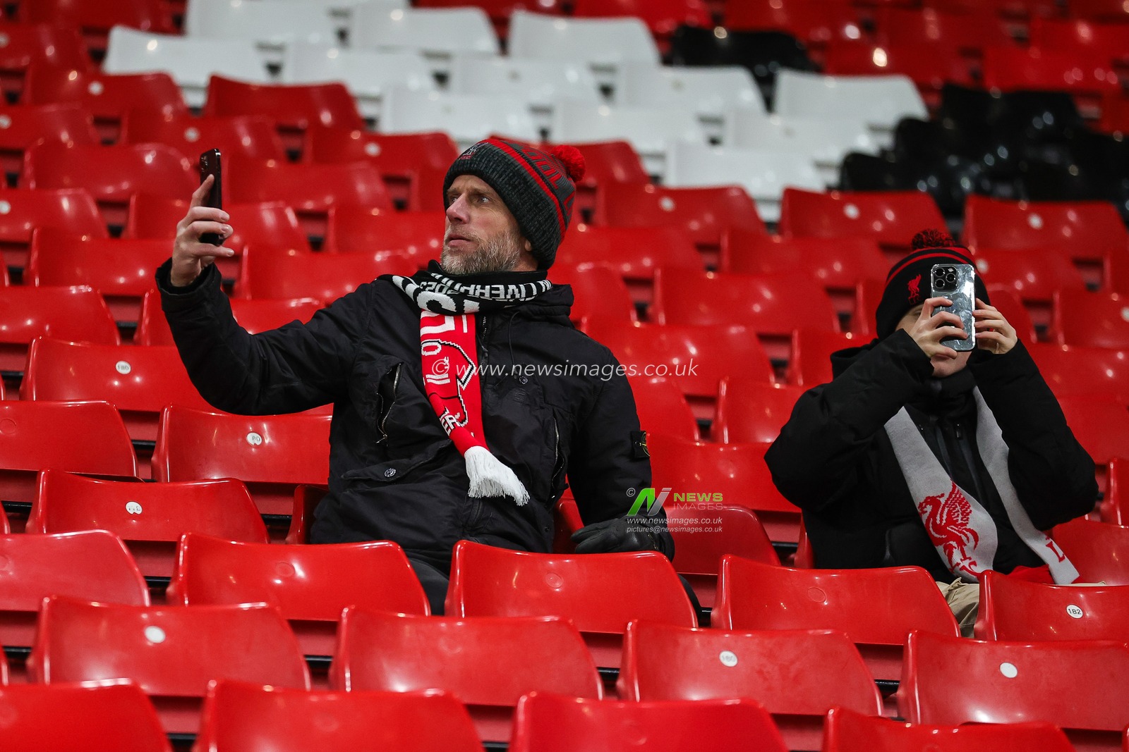 Liverpool fans take selfies as they take there seats ahead of the UEFA Europa League match Liverpool vs LASK at Anfield, Liverpool, United Kingdom, 30th November 2023

(Photo by Mark Cosgrove/News Images)