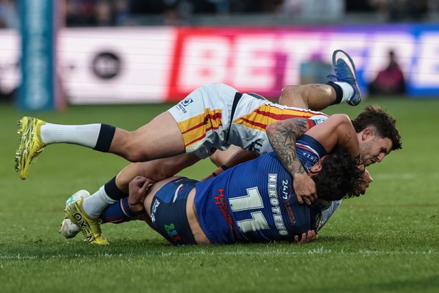 Seth Nikotemo of Wakefield Trinity is tackled by Toby Sexton of Catalans Dragons during the Betfred Super League round 11 match Wakefield Trinity vs Catalans Dragons at DIY Kitchens Stadium, Wakefield, United Kingdom on 15 May 2026

(Photo by Mark Cosgrove/News Images)