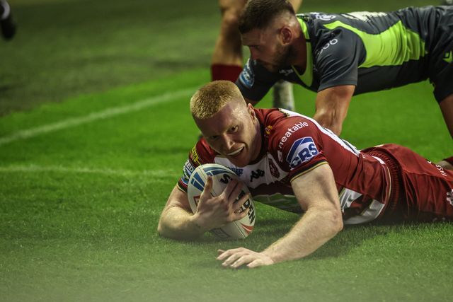 Zach Eckersley of Wigan Warriors goes over for a try during the Betfred Super League round 20 match Wigan Warriors vs Catalans Dragons at The Brick Community Stadium, Wigan, United Kingdom, 25th July 2025

(Photo by Alfie Cosgrove/News Images)