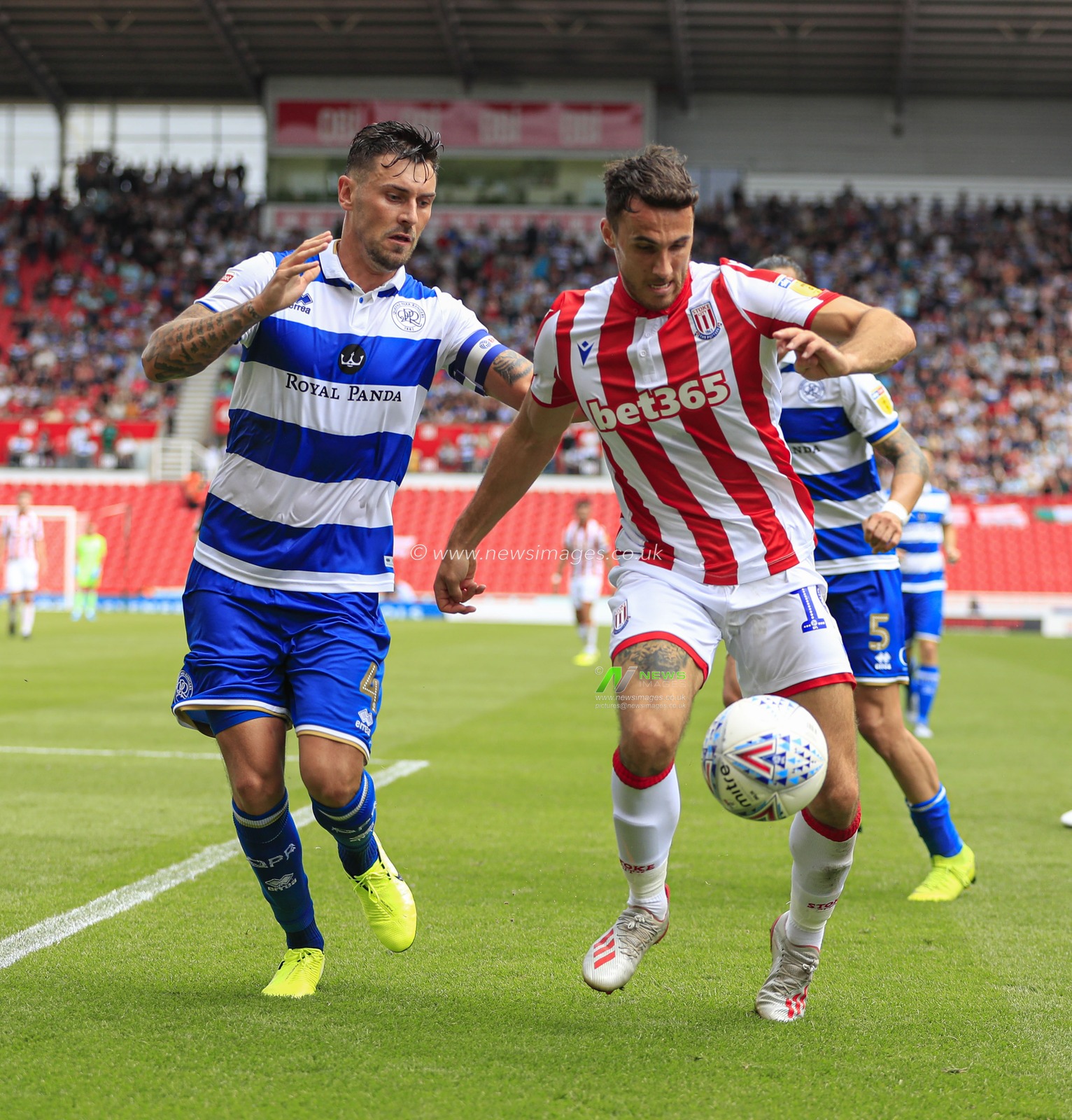 3rd August 2019, Bet365 Stadium, Stoke-on-Trent, England; Sky Bet Championship, Stoke City v Queens Park Rangers ; Lee Gregory (19) of Stoke City and Grant Hall (04) of Queens Park Rangers challenge for the ball

Credit: Conor Molloy/News Images

English Football League images are subject to DataCo Licence
