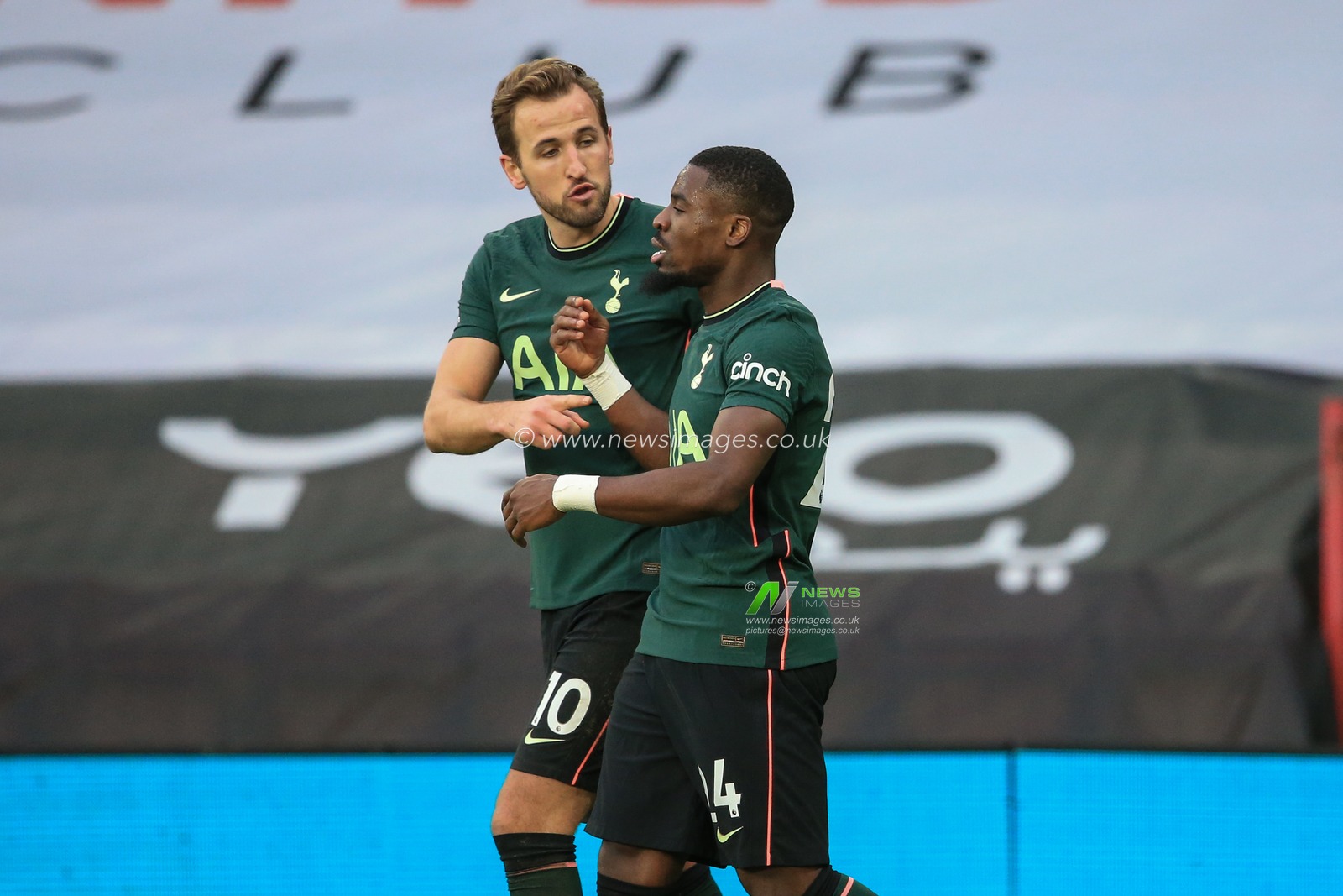 Harry Kane #10 of Tottenham Hotspur and Serge Aurier #24 of Tottenham Hotspur talk about the creations of Tanguy NDombele #28 of Tottenham Hotspurâ€™s goal as Tottenham go 1-3 up