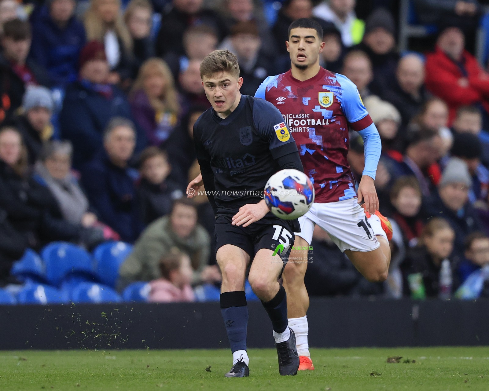 Scott High #15 of Huddersfield Town passes the ball during the Sky Bet Championship match Burnley vs Huddersfield Town at Turf Moor, Burnley, United Kingdom, 25th February 2023

(Photo by Conor Molloy/News Images)