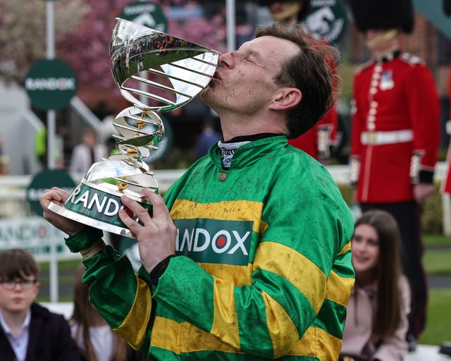 Paul Townend kisses the Grand National Trophy after winning for the second time on I Am Maximus in the 16:00 Randox Grand National Handicap Chase during the 2026 Randox Grand National Day at Aintree Racecourse, Aintree, United Kingdom on 11 April 2026

(Photo by Mark Cosgrove/News Images)