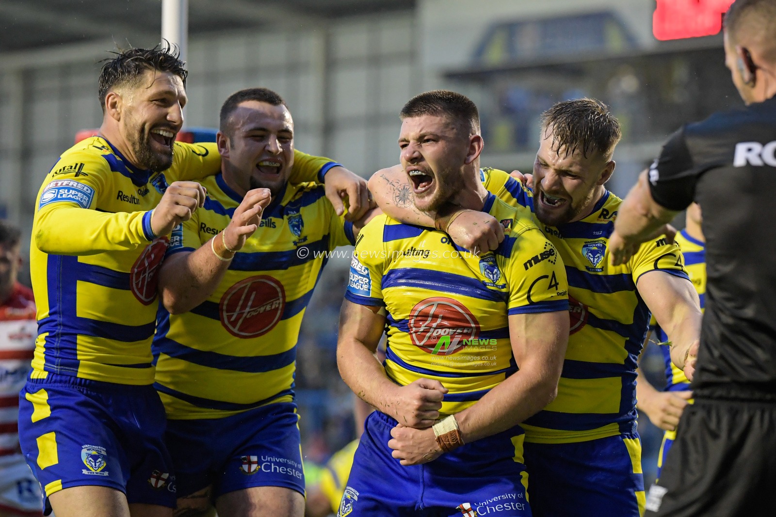 Danny Walker (16) of Warrington Wolves celebrates scoring a try to make it 30-12