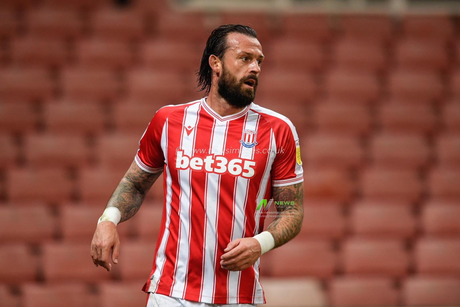 Steven Fletcher (21) of Stoke City in action during the game
