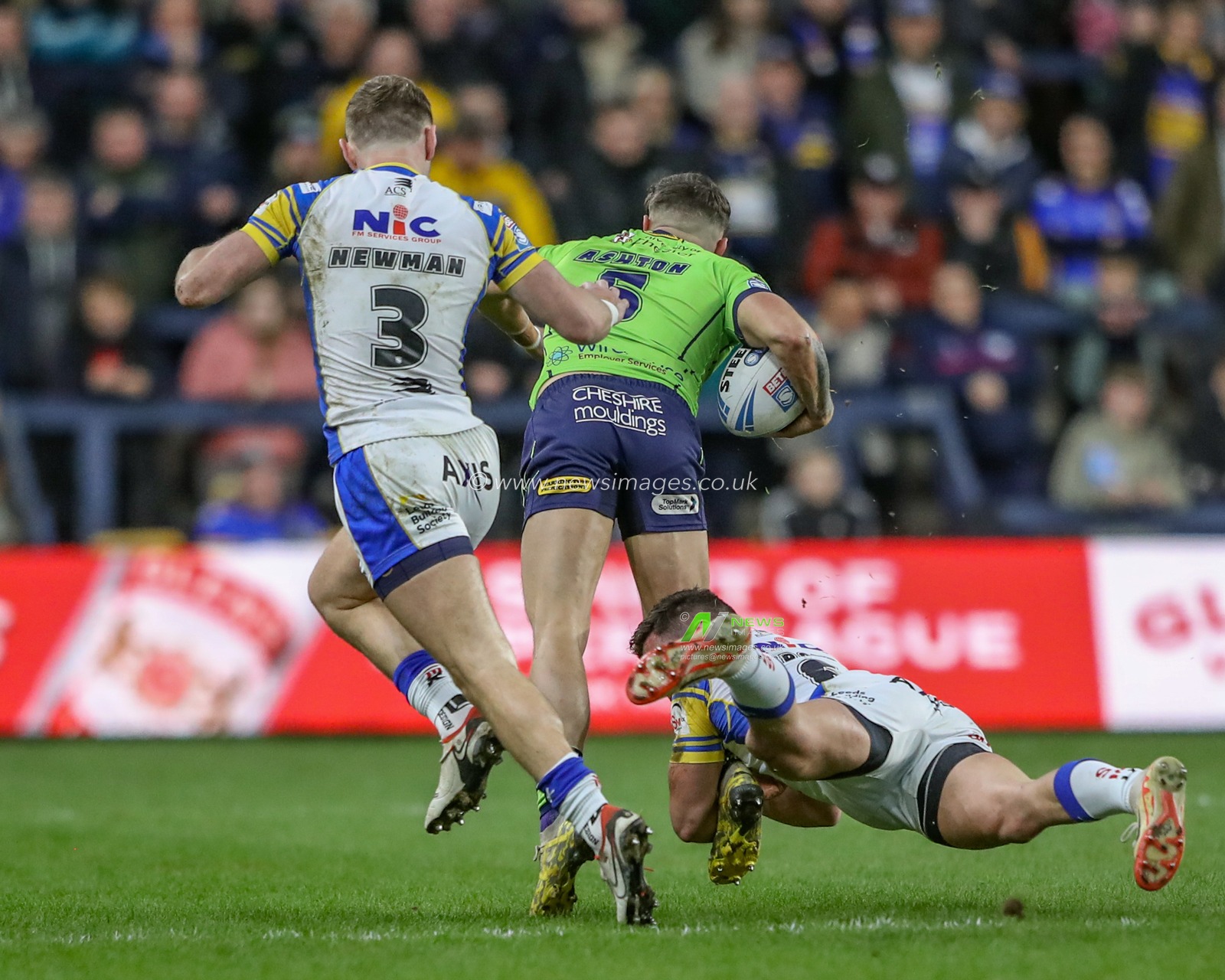 Matty Ashton of Warrington Wolves is tackled during the Betfred Super League Round 7 match Leeds Rhinos vs Warrington Wolves at Headingley Stadium, Leeds, United Kingdom, 5th April 2024

(Photo by Alfie Cosgrove/News Images)