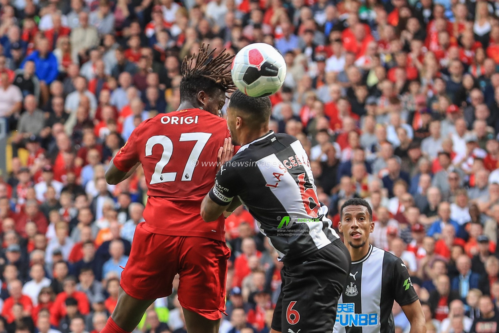 14th September 2019 , Anfield, Liverpool, England; Premier League Football, Liverpool vs Newcastle United ; Divock Origi (27) of Liverpool  sees his header deflected by Jamaal Lascelles (6) of Newcastle United 


Credit: Mark Cosgrove/News Images 


Premier League/EFL Football images are subject to DataCo Licence