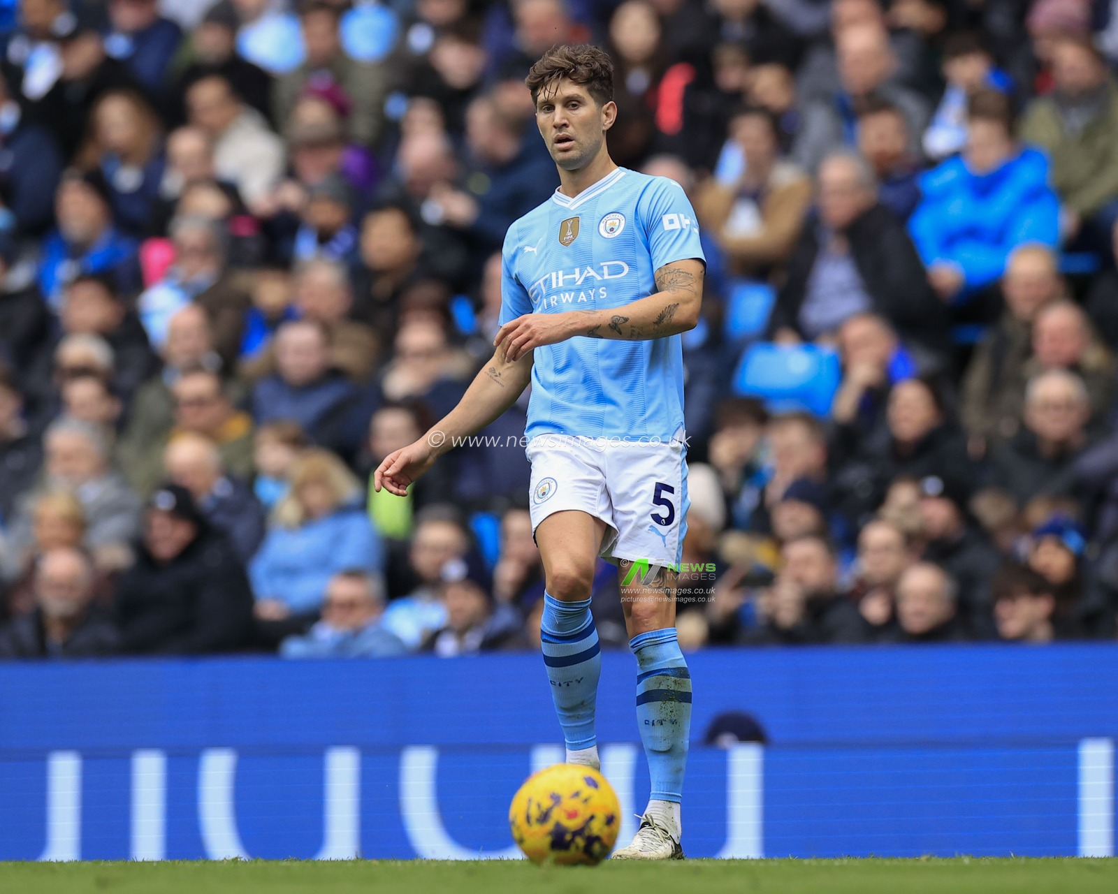 John Stones of Manchester City passes the ball during the Premier League match Manchester City vs Everton at Etihad Stadium, Manchester, United Kingdom, 10th February 2024

(Photo by Conor Molloy/News Images)