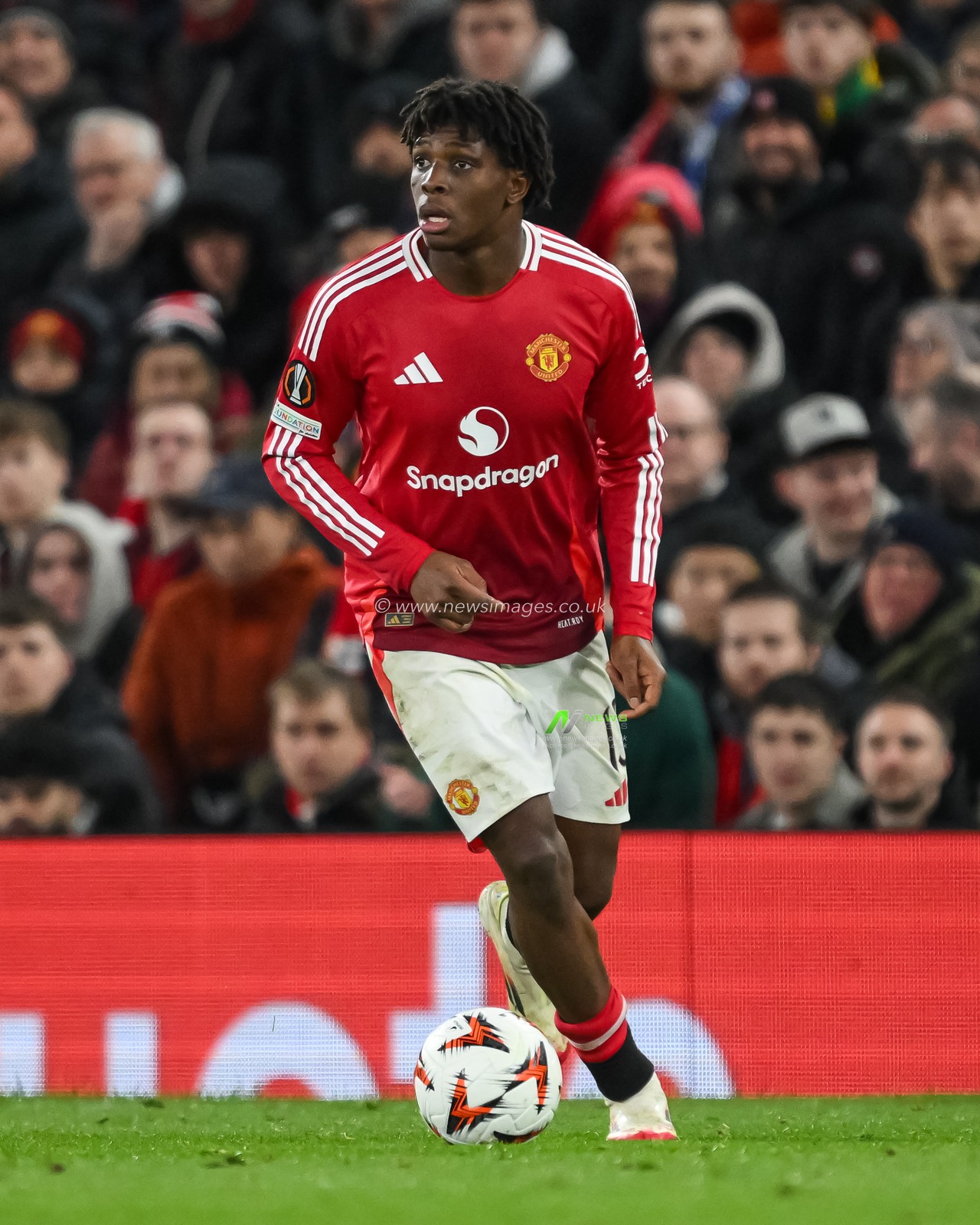 Patrick Dorgu of Manchester United in action with the ball during the UEFA Europa League Last 16 match Manchester United vs Real Sociedad at Old Trafford, Manchester, United Kingdom, 13th March 2025

(Photo by Craig Thomas/News Images)