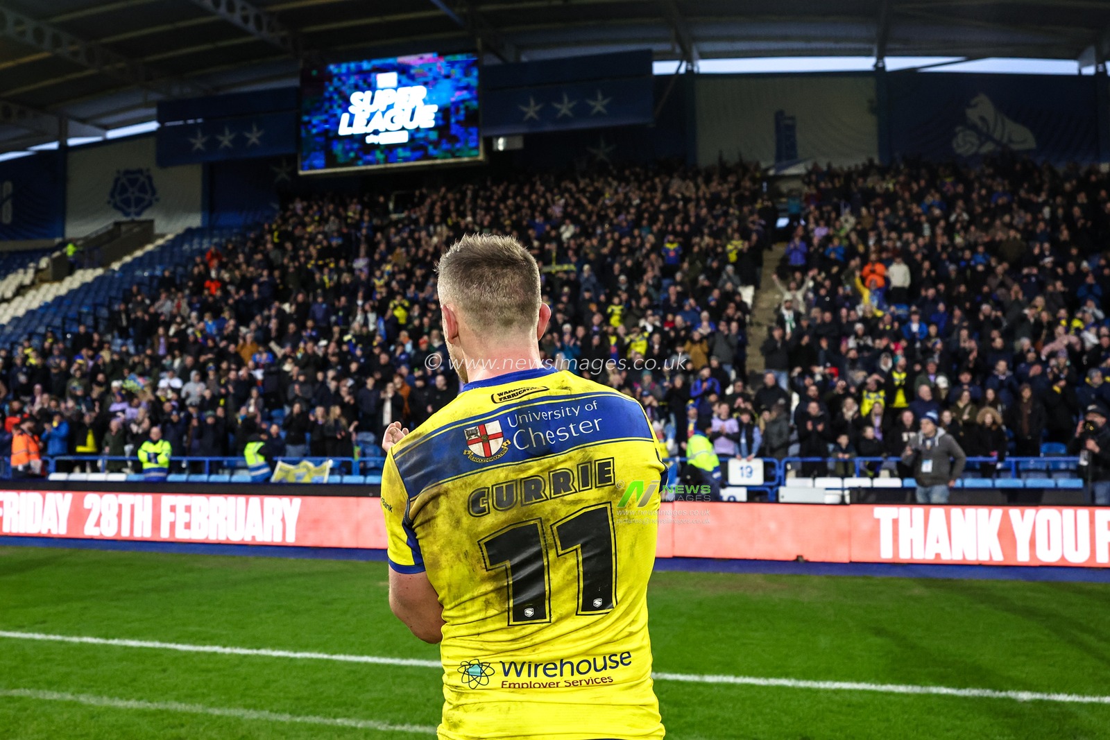 Ben Currie of Warrington Wolves celebrates the win with the traveling fans during the Betfred Super League Round 1 match Huddersfield Giants vs Warrington Wolves at John Smith's Stadium, Huddersfield, United Kingdom, 16th February 2025

(Photo by Mark Cosgrove/News Images)