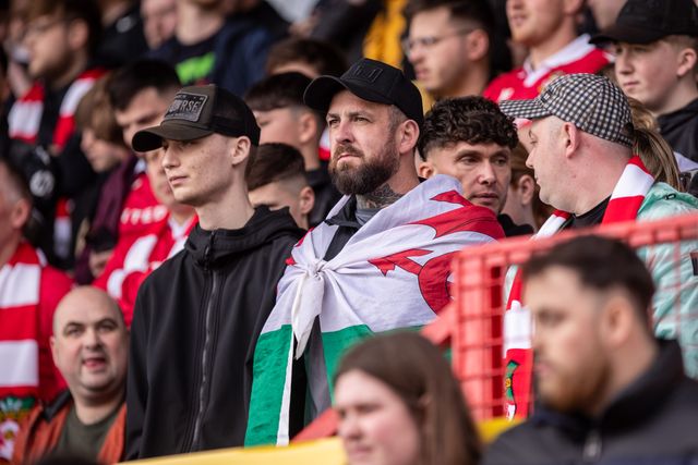 Wrexham fans during the Sky Bet League 1 match Wrexham vs Stockport County at SToK Cae Ras, Wrexham, United Kingdom, 22nd March 2025

(Photo by Nik Mesney/News Images)