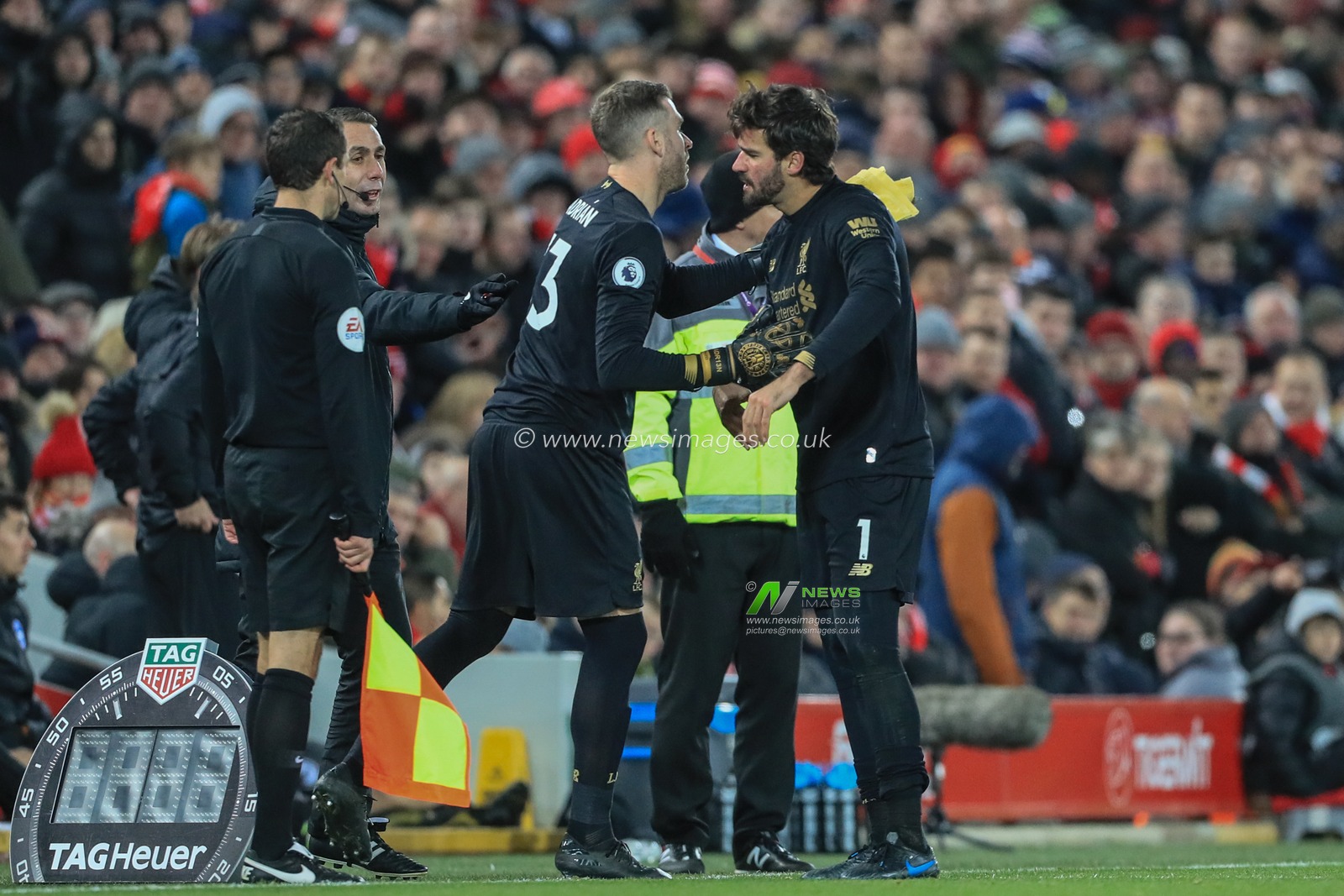 30th November 2019, Anfield, Liverpool, England; Premier League, Liverpool v Brighton and Hove Albion : Adrian (13) of Liverpool shakes hands with Alisson (1) of Liverpool as heâ€™s sent off 

Credit: Mark Cosgrove/News Images