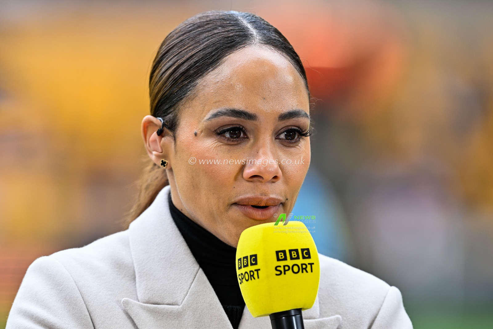 Alex Scott gives an interview ahead of the FA Women's League Cup Final match Arsenal Women vs Chelsea FC Women at Molineux, Wolverhampton, United Kingdom, 31st March 2024

(Photo by Cody Froggatt/News Images)