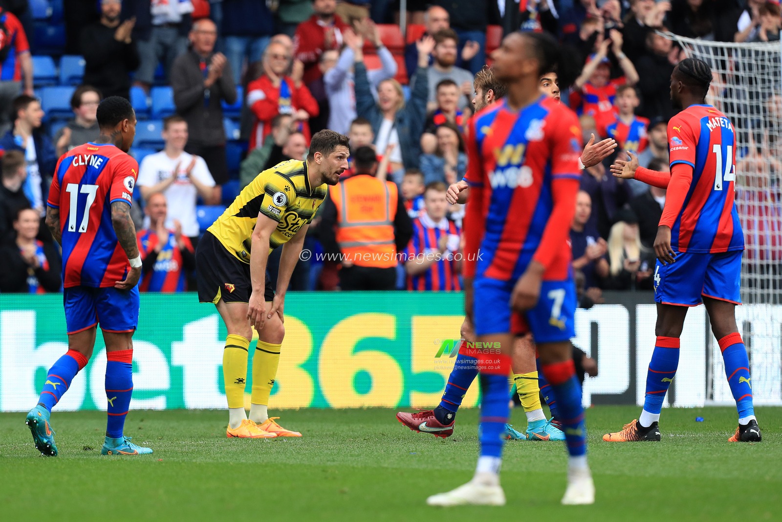 The full time whistle goes and confirms relegation for Watford.  Craig Cathcart #15 of Watford shows disappointment.