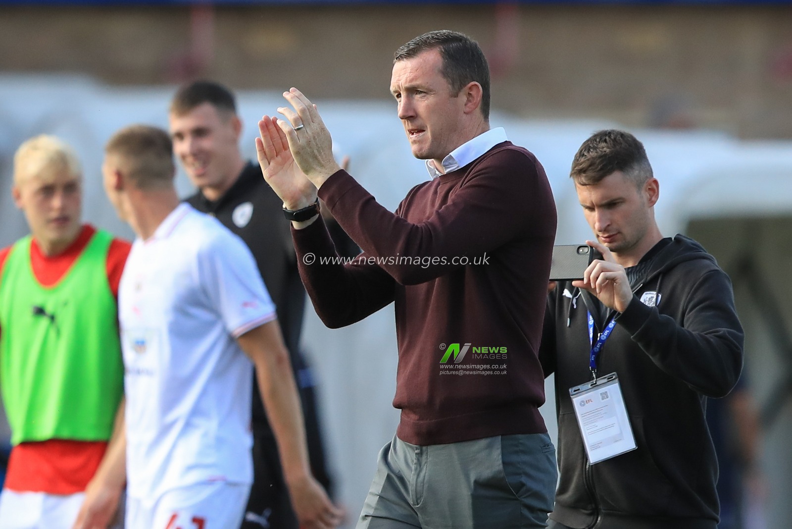Neill Collins Head coach of Barnsley applauds the travelling fans after Barnsley win 0-2 during the Sky Bet League 1 match Cheltenham Town vs Barnsley at The Jonny-Rocks Stadium, Cheltenham, United Kingdom, 2nd September 2023

(Photo by Alfie Cosgrove/News Images)