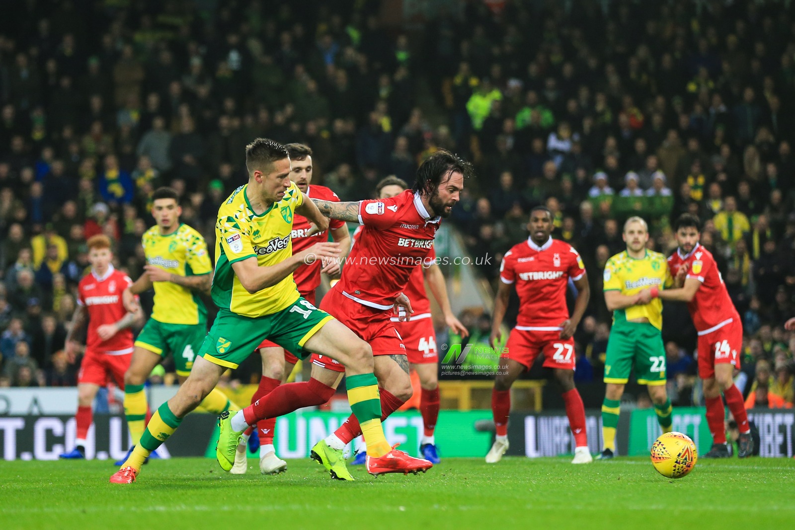 26th December 2018, Carrow Road, Norfolk, England; Sky Bet Championship, Norwich City vs Nottingham Forest ;  Marco Stiepermann (18) of Norwich City and Danny Fox (04) of Nottingham Forest challenge for the ball.

Credit: Georgie Kerr/News Images

English Football League images are subject to DataCo Licence
