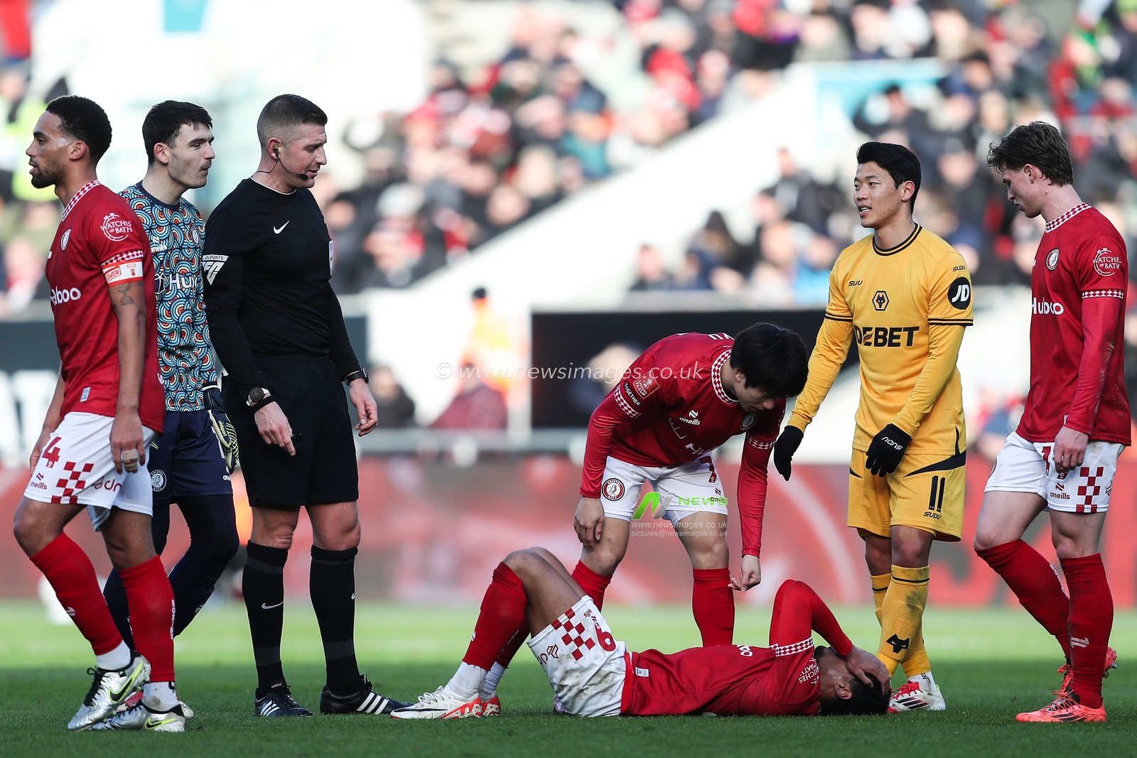George Tanner of Bristol City goes down injured during the Emirates FA Cup 3rd Round match Bristol City vs Wolverhampton Wanderers at Ashton Gate, Bristol, United Kingdom, 11th January 2025

(Photo by Gareth Evans/News Images)