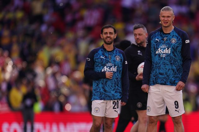 Bernardo Silva of Manchester City and Erling Haaland of Manchester City look on during warm up ahead of the Emirates FA Cup Semi-Final match Manchester City vs Southampton at Wembley Stadium, London, United Kingdom on 25 April 2026

(Photo by Harvey Murphy/News Images)