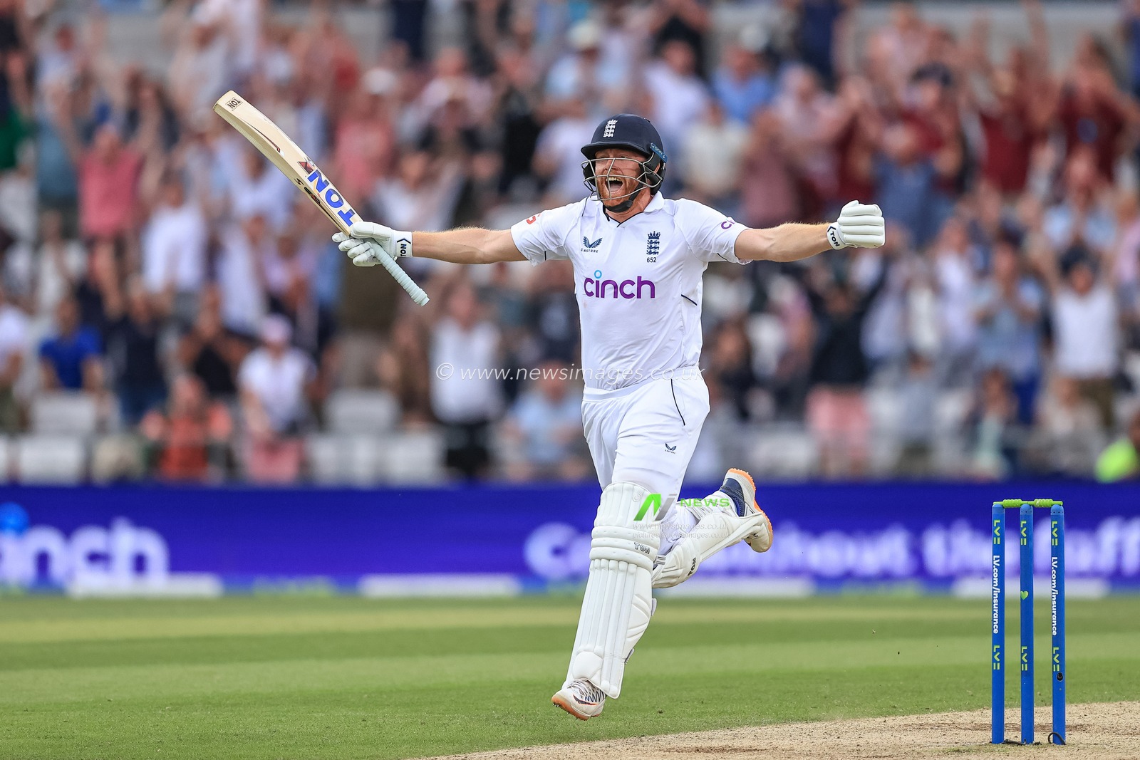 Jonny Bairstow of England celebrates a century (100 runs) after hitting a four