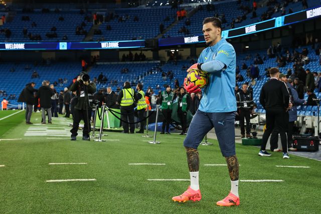 Ederson of Manchester City comes out for during the pre-game warmup ahead of the Premier League match Manchester City vs Manchester United at Etihad Stadium, Manchester, United Kingdom, 15th December 2024

(Photo by Mark Cosgrove/News Images)