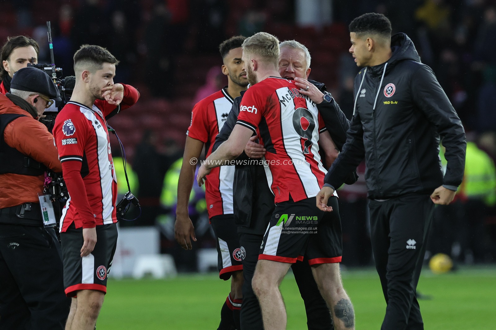 Chris Wilder manager of Sheffield United congratulates Oliver McBurnie of Sheffield United after he scores a penalty late in the game to draw 2-2 during the Premier League match Sheffield United vs West Ham United at Bramall Lane, Sheffield, United Kingdom, 21st January 2024

(Photo by Mark Cosgrove/News Images)