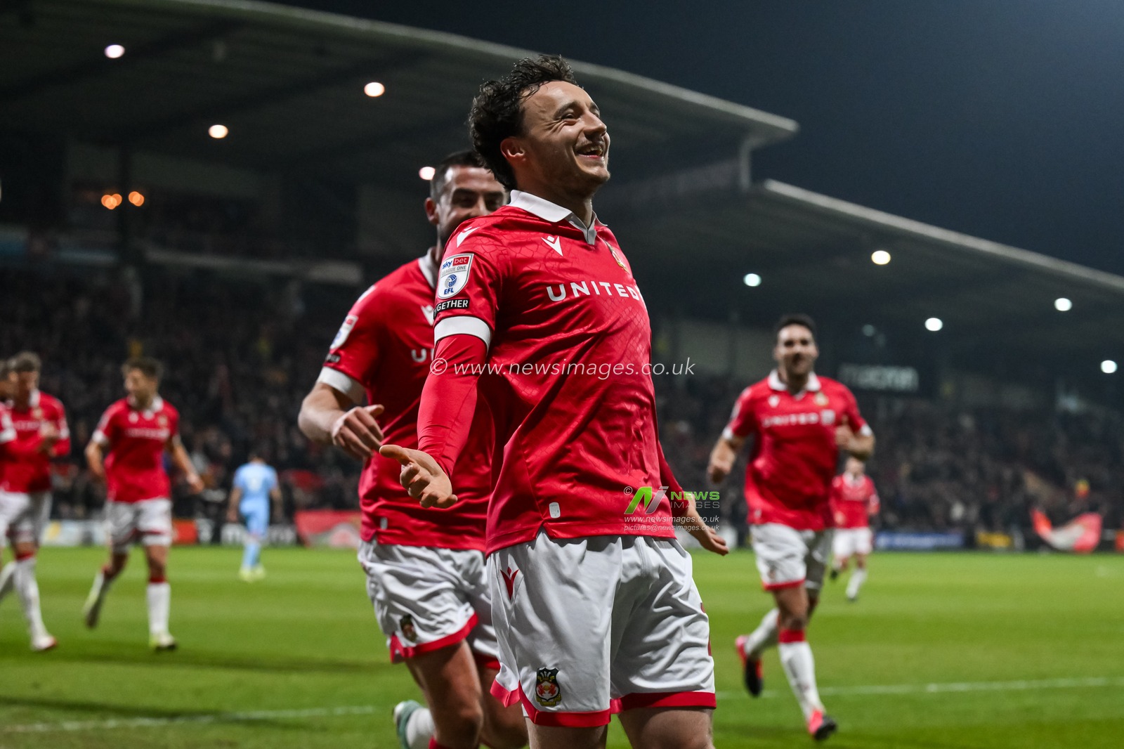 Ollie Rathbone of Wrexham celebrates his goal to make it 1-0 during the Sky Bet League 1 match Wrexham vs Leyton Orient at SToK Cae Ras, Wrexham, United Kingdom, 18th February 2025

(Photo by Craig Thomas/News Images)