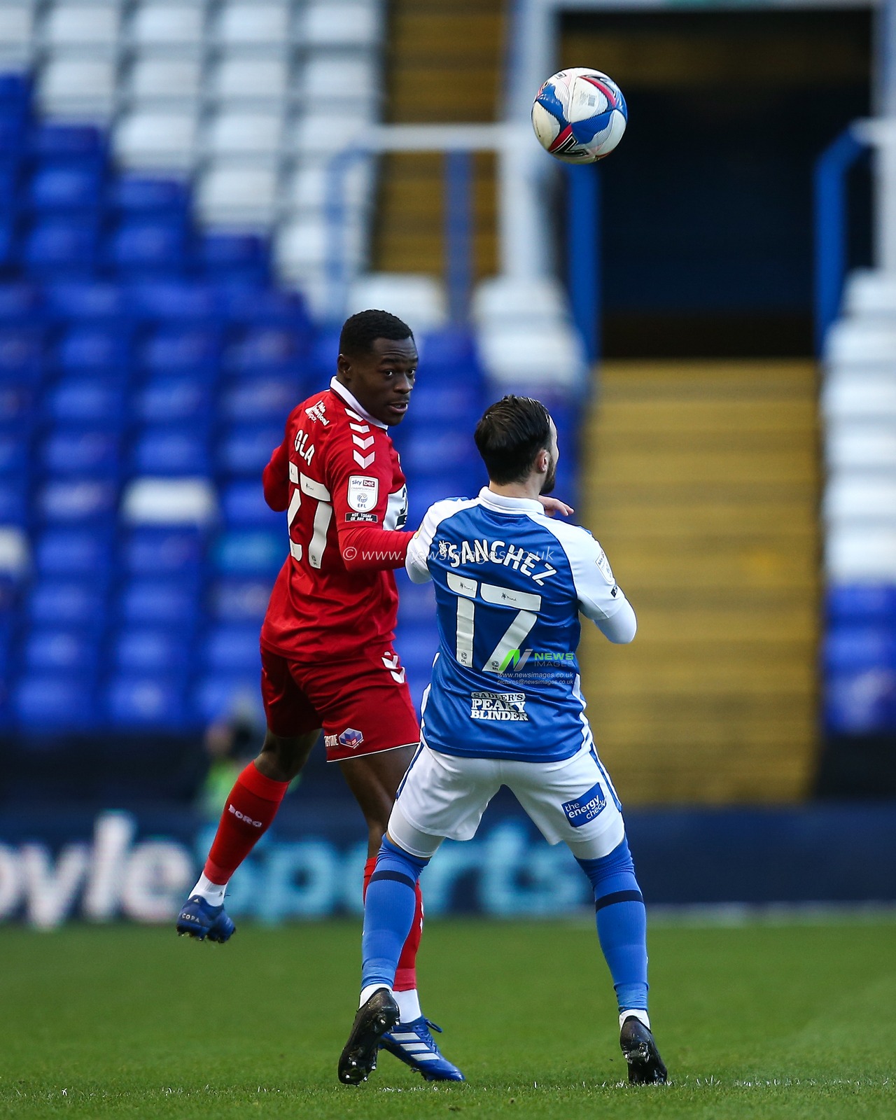 Marc Bola #27 of Middlesbrough heads the ball