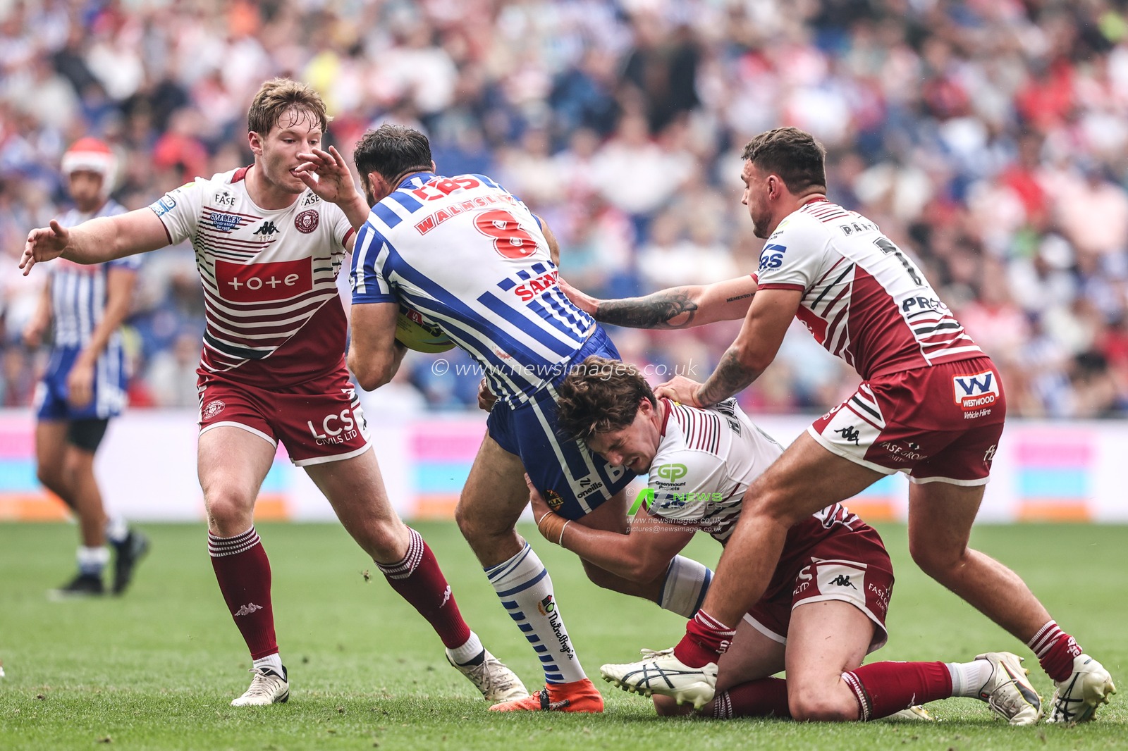 Ethan Havard of Wigan Warriors is tackled by Ethan Havard of Wigan Warriors during the Betfred Super League Magic Weekend match Wigan Warriors vs St Helens at Hill Dickinson Stadium, Liverpool, United Kingdom on 05 July 2026

(Photo by Alfie Cosgrove/News Images)