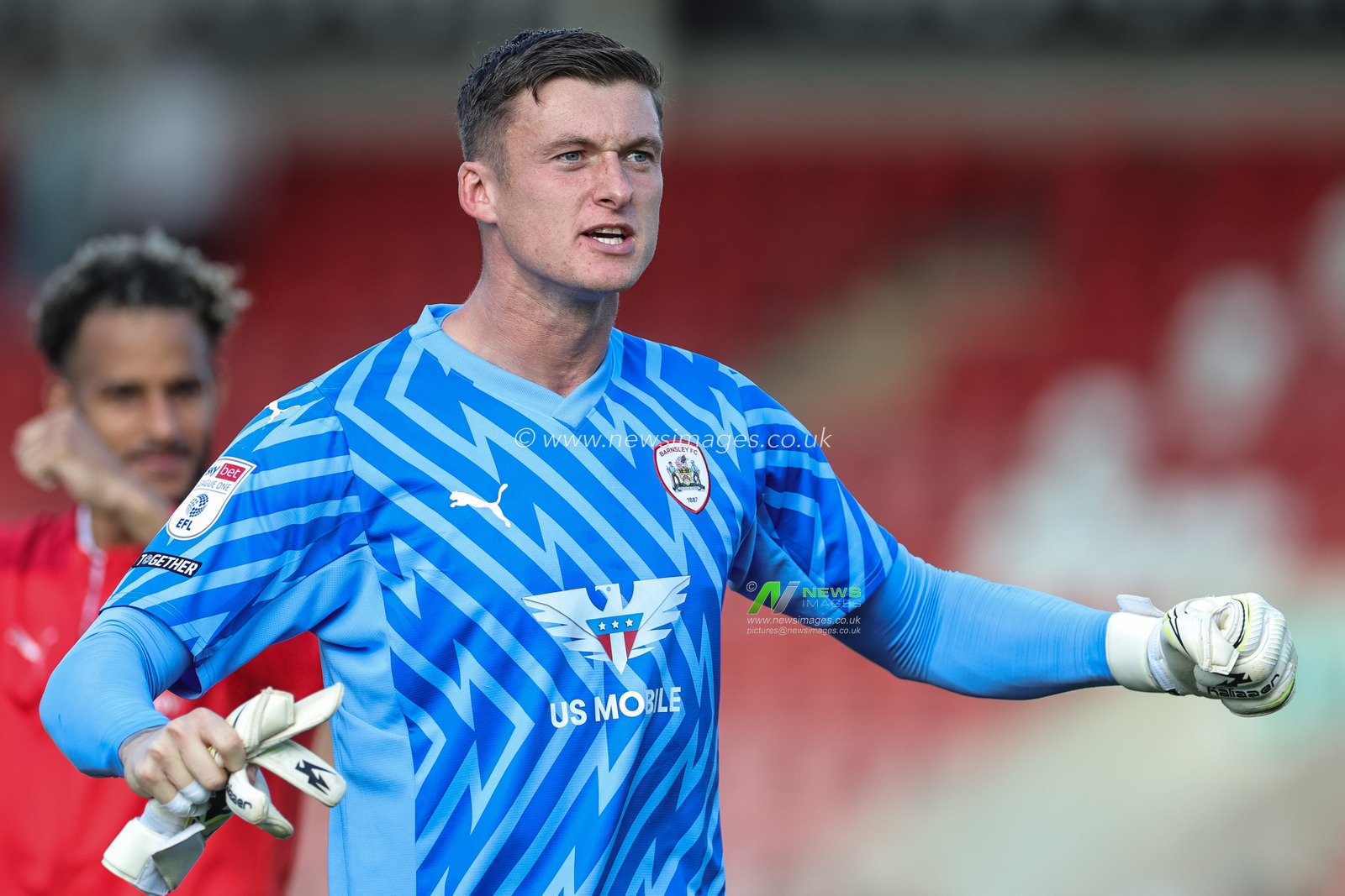 Liam Roberts #1 of Barnsley celebrates the 0-2 win with the traveling fans during the Sky Bet League 1 match Cheltenham Town vs Barnsley at The Jonny-Rocks Stadium, Cheltenham, United Kingdom, 2nd September 2023

(Photo by Mark Cosgrove/News Images)