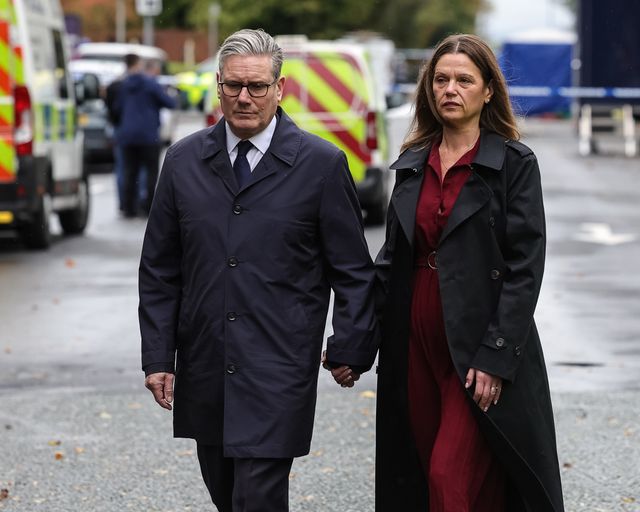 Sir Keir Starmer, Prime Minister of the United Kingdom of Great Britain and Northern Ireland and his wife Victoria, Lady Starmer hold hands as they leave the scene during the Manchester synagogue terror attack day 2 at Heaton Park Shul, Manchester, United Kingdom, 3rd October 2025

(Photo by Mark Cosgrove/News Images)